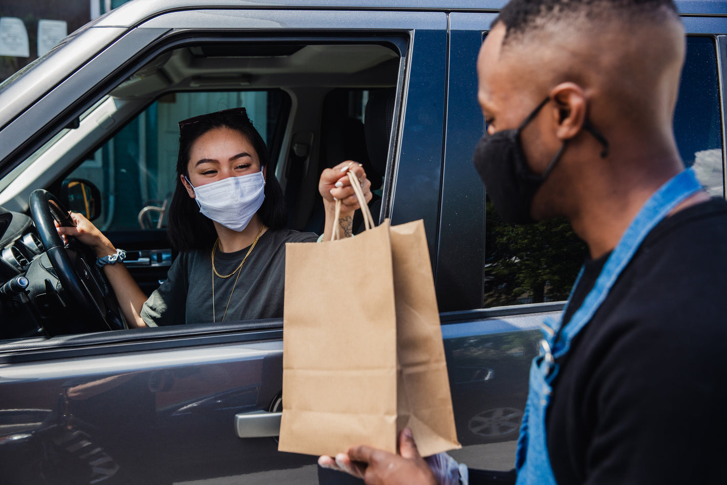 passing-curbside-pickup-order-through-window.jpg | Miami Beauty Supply